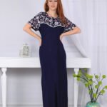 A long nightgown with a floral print on the chest with buttons