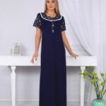 A long nightgown with a floral print on the chest with buttons