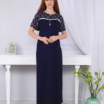 A long nightgown with a floral print on the chest with buttons